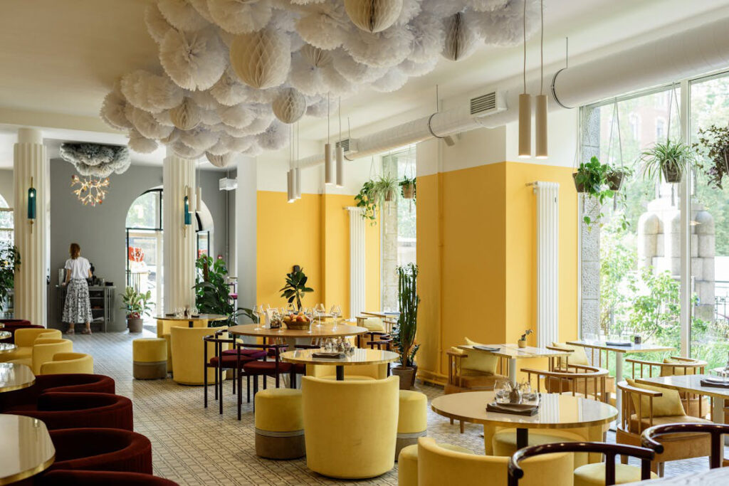 A restaurant with yellow interior